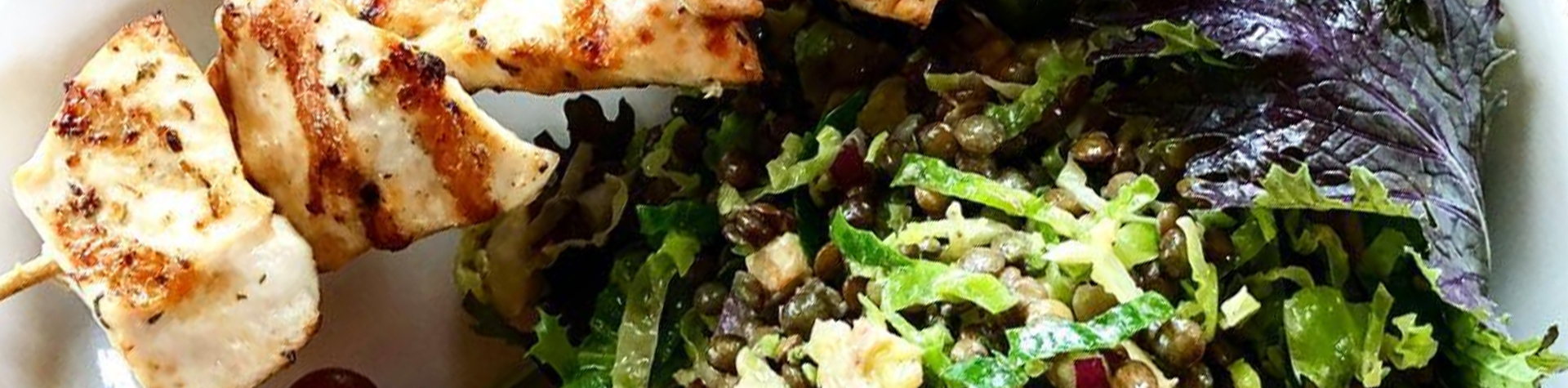 FOOD SLIDER NARROW 1_0002_Screen Shot 2020-12-22 at 4.26.22 PM Salad and Chicken Skewer Plated